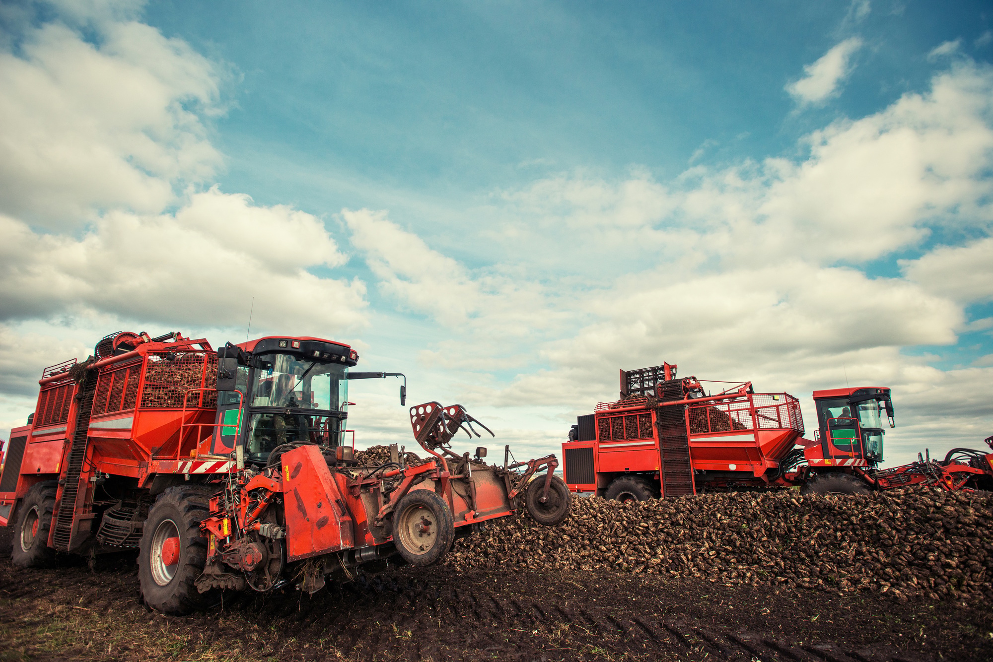 tractors working in the field. Carpathians. Ukraine Europe